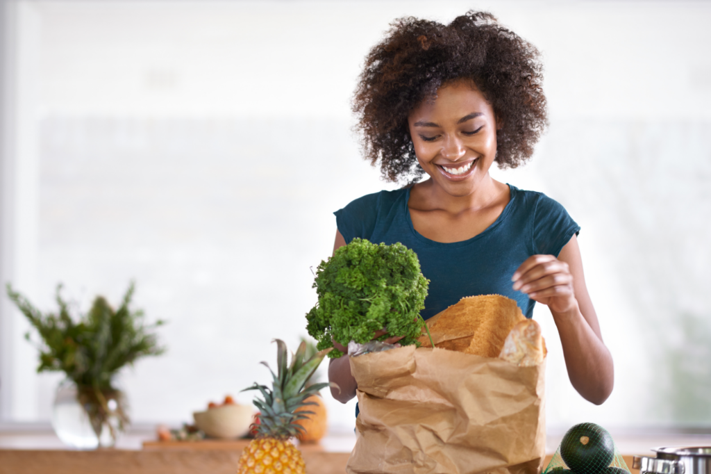 A women unloading a bag of groceries